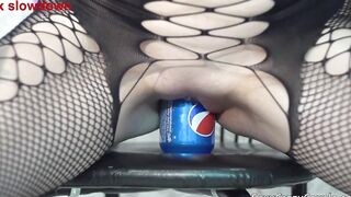 Tiffany has fun with a can of Pepsi and Red Bull