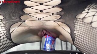 Tiffany has fun with a can of Pepsi and Red Bull