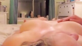 Big Boob Babe Shows Off Her Massive Breasts in Home Video