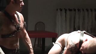 Bound Blonde Dominatrix Spanking Submissive Guy with Big Dick in Bondage Playroom