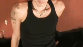 Tatted-Up Alt Guy Wanking His Massive Dick" or "Intense Masturbation Session by Alternative Man