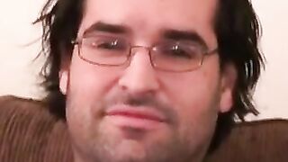 Glasses-Wearing Hunk Jerks Off For The Camera