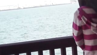 Sweet Asian girl roped to fence desperate to release bladder