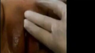 Asian girl spreads and fingers herself on webcam.