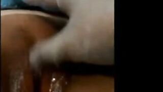 Asian girl spreads and fingers herself on webcam.