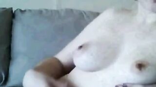 Glasses-wearing Woman Shows Off Her Tits on Webcam