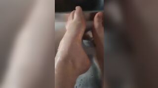 BBW splashes her adorable foot into the bathtub.