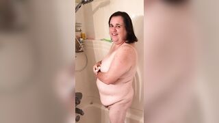 Naomi takes a shower