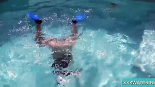 Hottie Candy swims and gets naked naked underwater