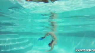 Hottie Candy swims and gets naked naked underwater
