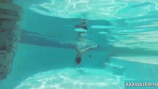 Hottie Candy swims and gets naked naked underwater