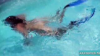 Hottie Candy swims and gets naked naked underwater