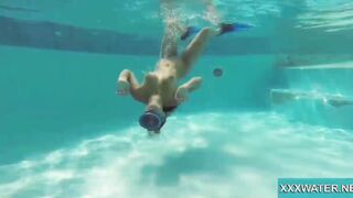 Hottie Candy swims and gets naked naked underwater