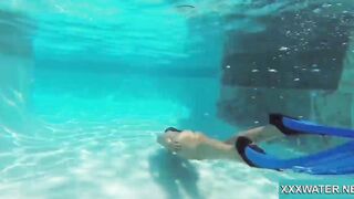 Hottie Candy swims and gets naked naked underwater