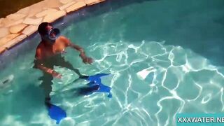 Hottie Candy swims and gets naked naked underwater