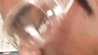 Young Latino wears goggles while cock riding
