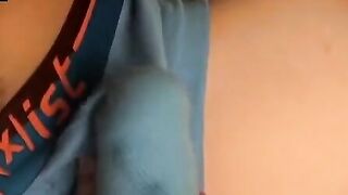 Solo twink fetishizing underwear while jerking off