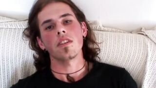 Long haired hunk Noah Wood handling his pulsing erection