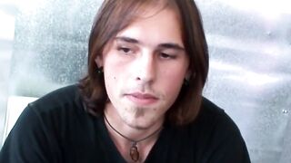 Long haired hunk Noah Wood handling his pulsing erection
