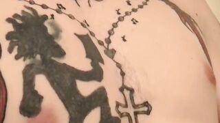 Tattooed thug flaunts toned body while jacking off