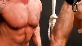 Rope bound Dirk Caber drips precum from his throbbing cock