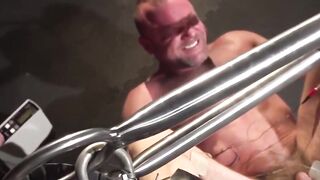 Master Chad Brock writhes under the electro pad torment