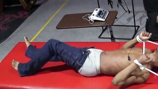 Kaden Roads slaps captive with flogger then plays with cock