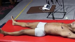 Kaden Roads slaps captive with flogger then plays with cock