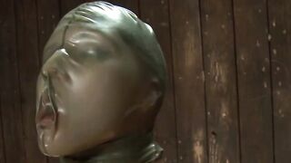 Latex smothering in threesome lezdom