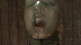 Latex smothering in threesome lezdom