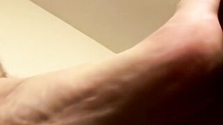 Tatted Boomer jerks cock till juice splashes over his foot