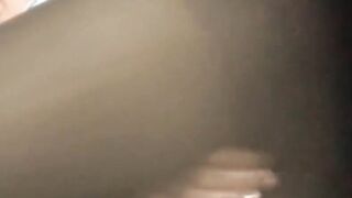 Oriental babe in red panties drills pussy in a solo act
