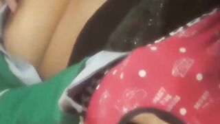Oriental babe in red panties drills pussy in a solo act