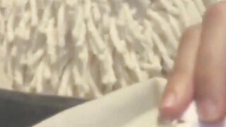 Aroused Asian lady caught on hidden cam fingering hard