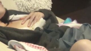 Aroused Asian lady caught on hidden cam fingering hard