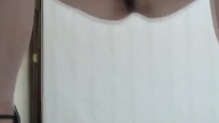 Brunette babe shows puddle after peeing before spycam