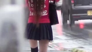 Peeping grabs Japanese girls skirt lifted by gusty breeze