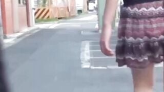 Peeping grabs Japanese girls skirt lifted by gusty breeze