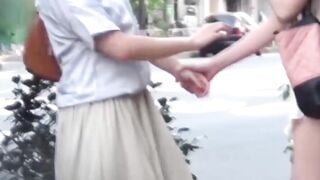 Peeping grabs Japanese girls skirt lifted by gusty breeze