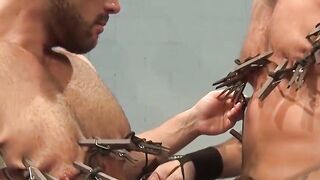 Colin Steele and Jessie Balboa clip clothespins on each other