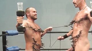 Colin Steele and Jessie Balboa clip clothespins on each other