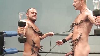 Colin Steele and Jessie Balboa clip clothespins on each other