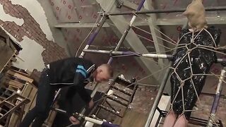 Bound slave edged painfully by master's skilled hands