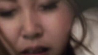 Alluring Asian hottie works clit with a pulsing vibrator