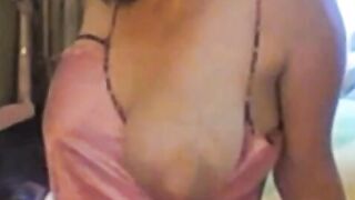 Big-Titted Amateur MILF Plays with Her Nipples on Webcam