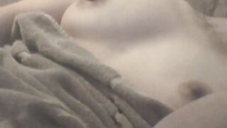 Hidden cam enjoys a view of a Japanese babe solo fingering