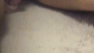 Japanese lady buzzes her hairy pussy with a loud vibrator