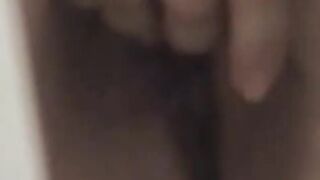 Japanese lady buzzes her hairy pussy with a loud vibrator