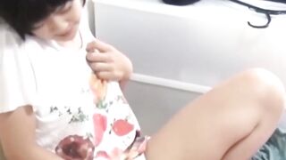 Lone Japanese vixen filmed probing her snug slit for pleasure