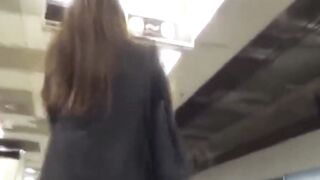 Asian ladies tailed by a voyeur until they piss in the toilet